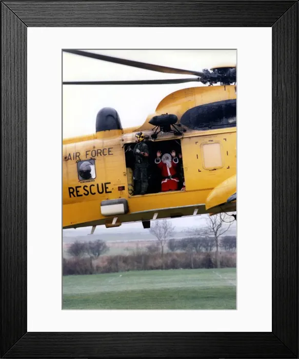 Framed Print : A RAF search and rescue Westland Sea King helicopter. Santa Claus
