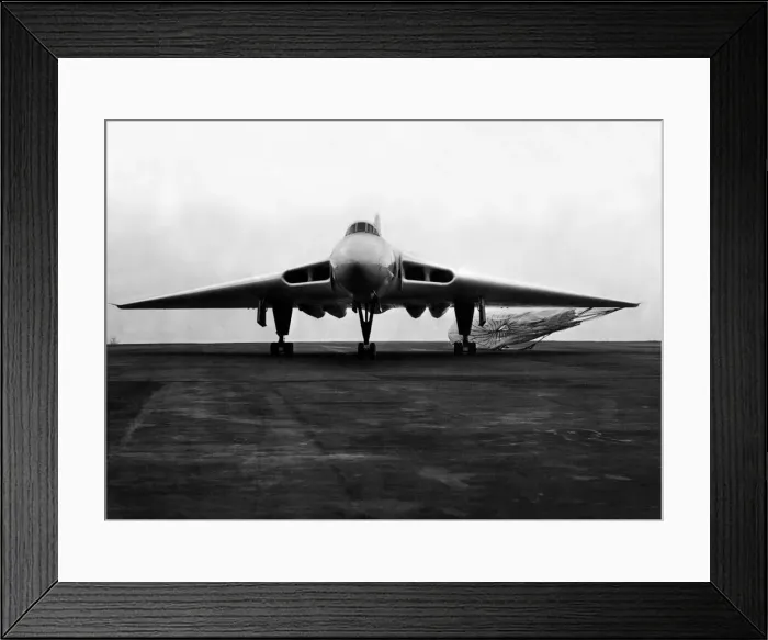 Framed Print : A RAF Avro Vulcan V-bomber touches down and brakes using it Framed Print : A RAF Avro Vulcan V-bomber touches down and brakes using it