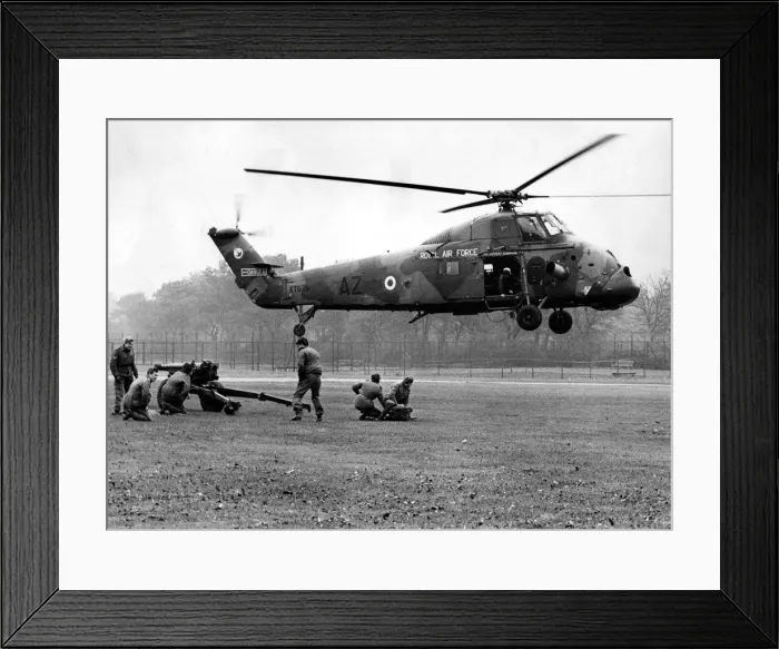 Framed Print : A gun crew of the 14th Light Regiment, Royal Artillery, stand at the ready as a Royal Air Framed Print : A gun crew of the 14th Light Regiment, Royal Artillery, stand at the ready as a Royal Air