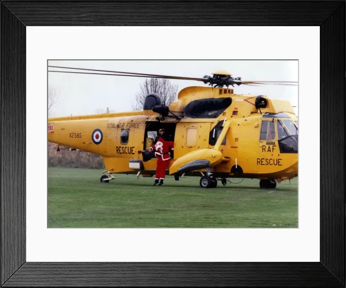 Framed Print : A RAF search and rescue Westland Sea King helicopter. Santa Claus Framed Print : A RAF search and rescue Westland Sea King helicopter. Santa Claus