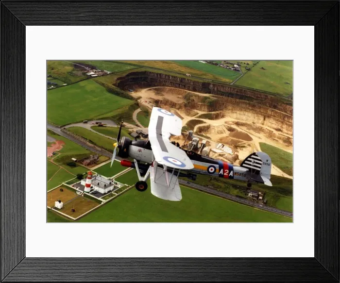 Framed Print : A Fairey Swordfish torpedo bomber aircraft flying over Souter Lighthouse Framed Print : A Fairey Swordfish torpedo bomber aircraft flying over Souter Lighthouse