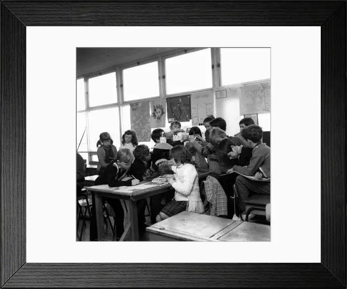 Framed Print : Pupils from John Street School in Jarrow, enjoying a relaxed classroom with lots reading Framed Print : Pupils from John Street School in Jarrow, enjoying a relaxed classroom with lots reading