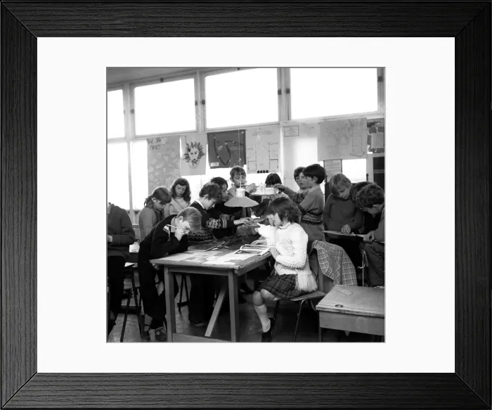 Framed Print : Pupils from John Street School in Jarrow, enjoying a relaxed classroom with lots reading Framed Print : Pupils from John Street School in Jarrow, enjoying a relaxed classroom with lots reading