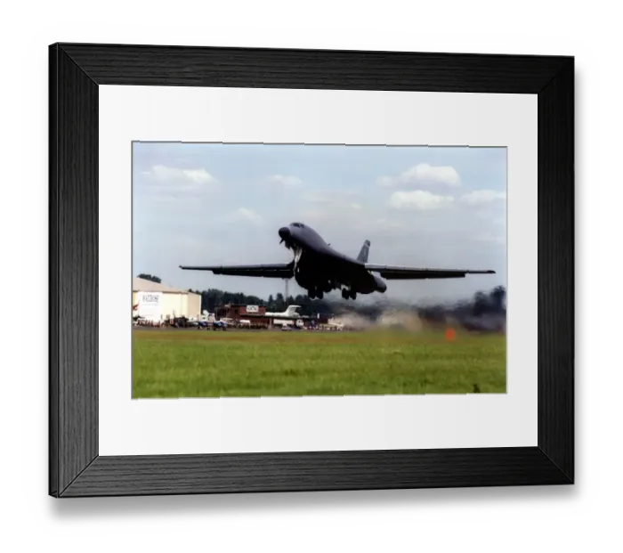 Framed Print : A United States Air Force Rockwell B-1 Lancer strategic bomber aircraft takes off on its
