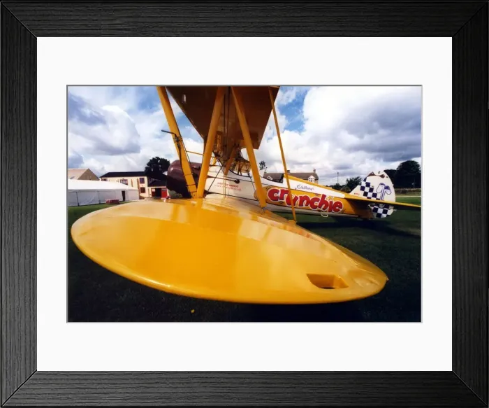 Framed Print : The Cadburys Crunchie Boeing-Stearman Model 75 biplane pictured at Elvington