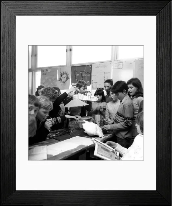 Framed Print : Pupils from John Street School in Jarrow, enjoying a relaxed classroom with lots reading Framed Print : Pupils from John Street School in Jarrow, enjoying a relaxed classroom with lots reading