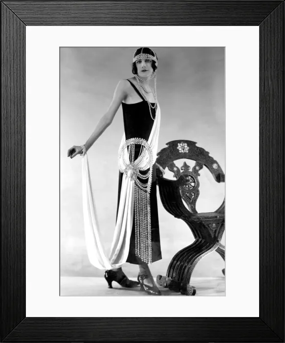 Framed Print : Woman wearing black dress with pearl bead detail at the waist and as a headdress Framed Print : Woman wearing black dress with pearl bead detail at the waist and as a headdress