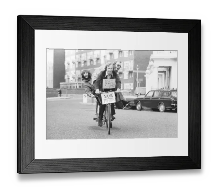 Framed Print : The Goodies, on the perfect answer to petrol rationing, ride their three seater tandem Framed Print : The Goodies, on the perfect answer to petrol rationing, ride their three seater tandem