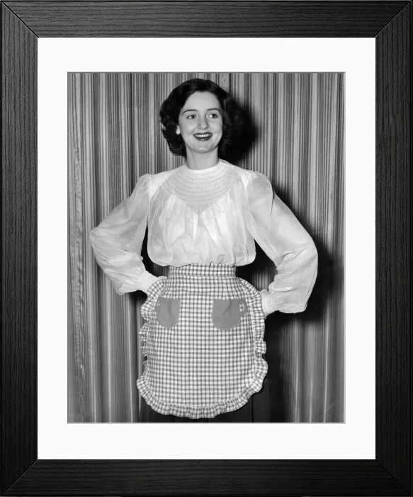 Framed Print : Clothing Fashion 1950: Tea-cup apron. May 1950 Framed Print : Clothing Fashion 1950: Tea-cup apron. May 1950
