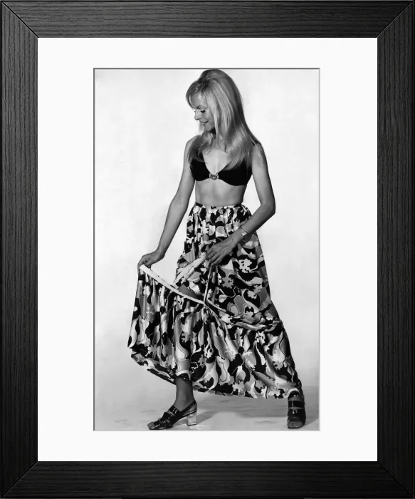 Framed Print : Clothing Fashions: Now with a quick tug the flounce pulls off. July 1970 Framed Print : Clothing Fashions: Now with a quick tug the flounce pulls off. July 1970