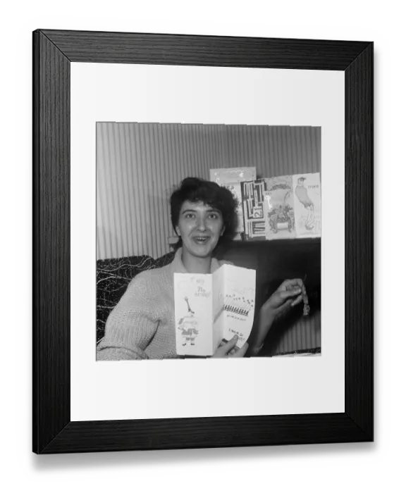 Framed Print : Salford born playwright Shelagh Delaney pictured opening 21st birthday cards at her home Framed Print : Salford born playwright Shelagh Delaney pictured opening 21st birthday cards at her home