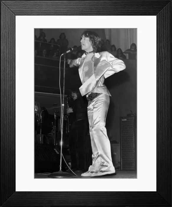Framed Print : Rolling Stones lead singer Mick Jagger performing on stage in Manchester during their