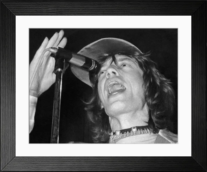 Framed Print : Rolling Stones lead singer Mick Jagger performing on stage in Manchester during their Framed Print : Rolling Stones lead singer Mick Jagger performing on stage in Manchester during their
