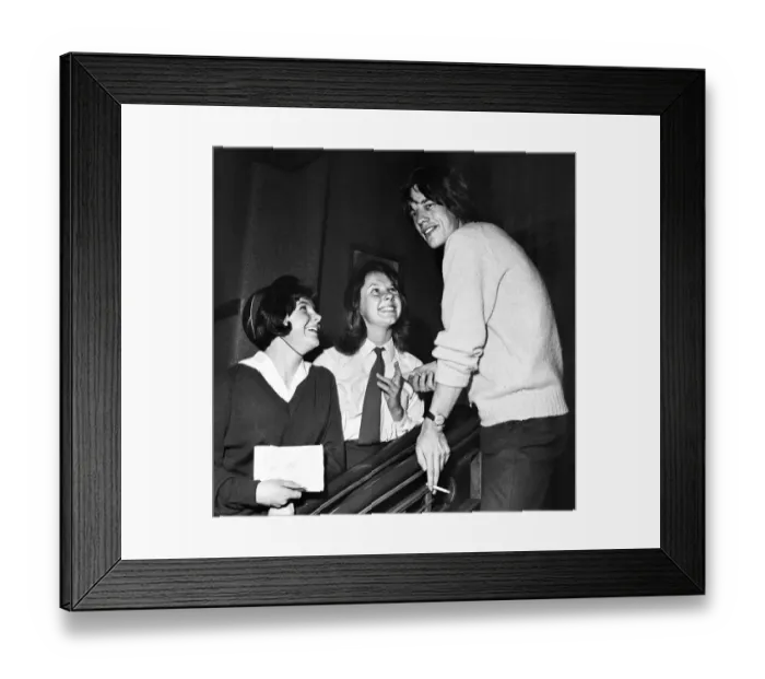 Framed Print : Rolling Stones fans Alison Anderson and Elizabeth Sayers seen here with Lead singer Mick