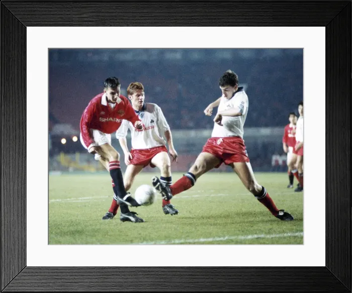 Framed Print : Manchester United Youth v York Youth. Yorks Paul Mockler tries to stop a shot