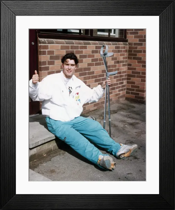 Framed Print : Manchester United youth team player Ben Thornley, on crutches after he was injured in a Framed Print : Manchester United youth team player Ben Thornley, on crutches after he was injured in a
