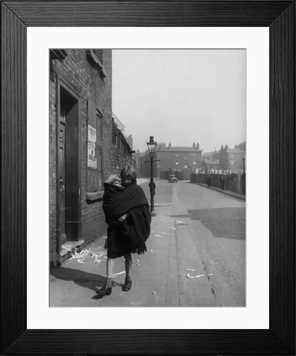 Framed Print : Young mother carries her child in a shawl, Liverpool. 3rd April 1939 Framed Print : Young mother carries her child in a shawl, Liverpool. 3rd April 1939