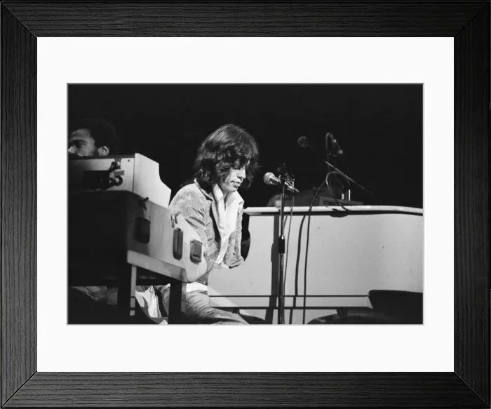 Framed Print : Mick Jagger of the Rolling Stones on stage in concert at Earls Court