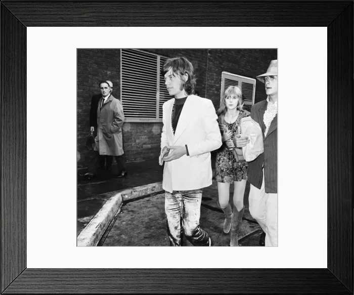 Framed Print : Rolling Stones lead singer Mick Jagger arrives at London Heathrow Airport with Marianne Framed Print : Rolling Stones lead singer Mick Jagger arrives at London Heathrow Airport with Marianne