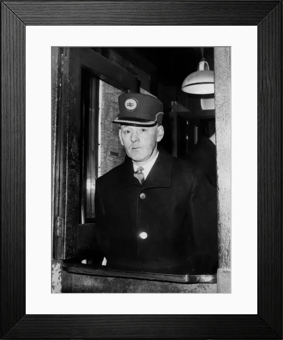 Framed Print : The new style hat for a Biritsh Rail ticket collector as seen on Mr