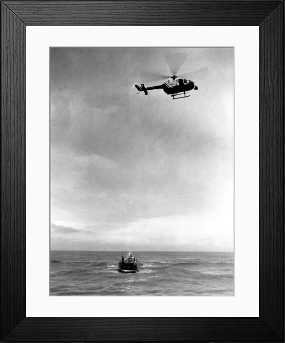 Framed Print : The Northumbria Police Air Support Unit MBB Bolkow BO105 helicopter flies over a RNLI Framed Print : The Northumbria Police Air Support Unit MBB Bolkow BO105 helicopter flies over a RNLI