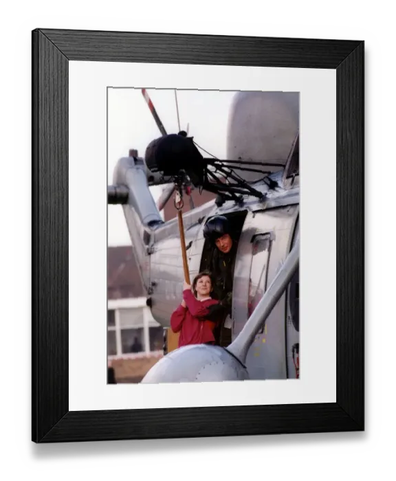 Framed Print : A Royal Navy Sea King helicopter visits Marden High School in Whitley Bay
