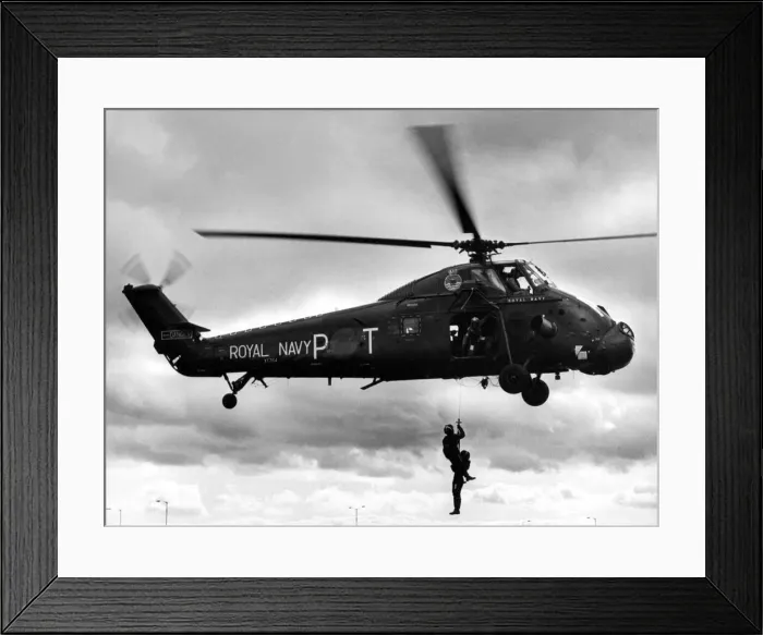 Framed Print : A Royal Navy Westland Wessex helicopter demonstrates search and rescue techniques Framed Print : A Royal Navy Westland Wessex helicopter demonstrates search and rescue techniques