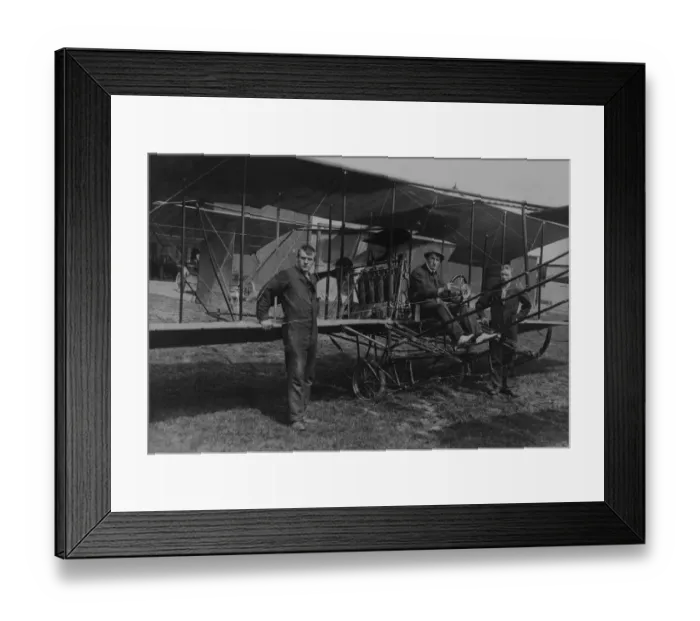 Framed Print : Mr Arthur George (Arthur E George) is seen at the controls of his homemade 80hp biplane