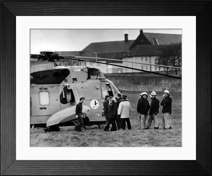 Framed Print : A RAF search and rescue Sea King helicopter from RAF Boulmer lands at Richardson Road
