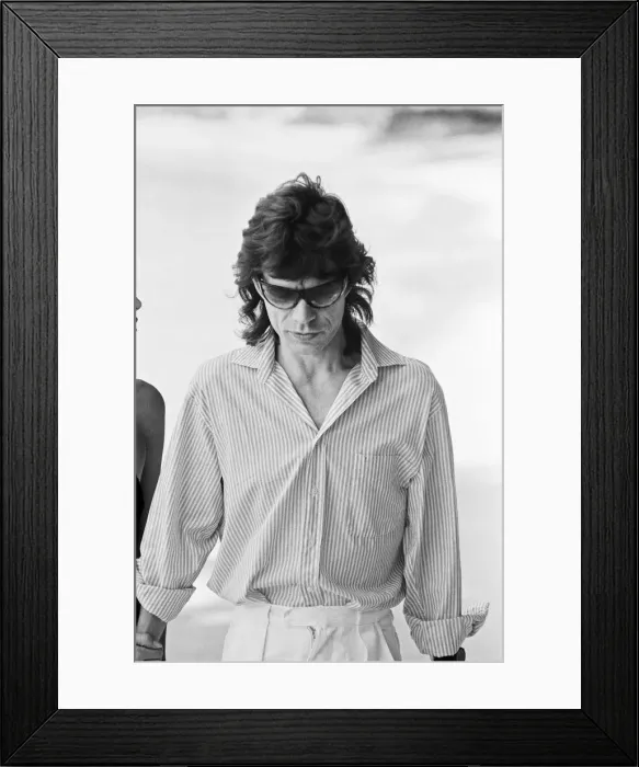 Framed Print : Mick Jagger seen here taking a stroll along the beach at Gibbs Bay in Barbados Framed Print : Mick Jagger seen here taking a stroll along the beach at Gibbs Bay in Barbados