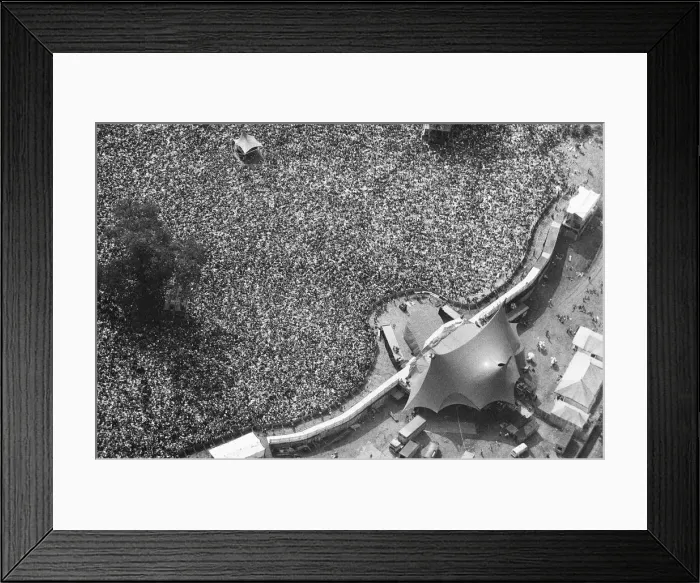 Framed Print : Huge crowds gather to watch the Rolling Stones in concert at Knebworth House