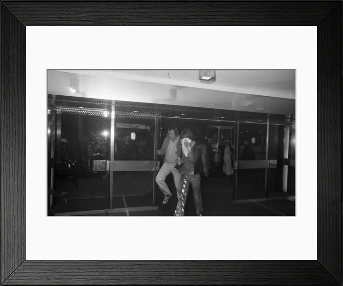 Framed Print : Mick Jagger of the Rolling Stones arriving at the Odeon New Street