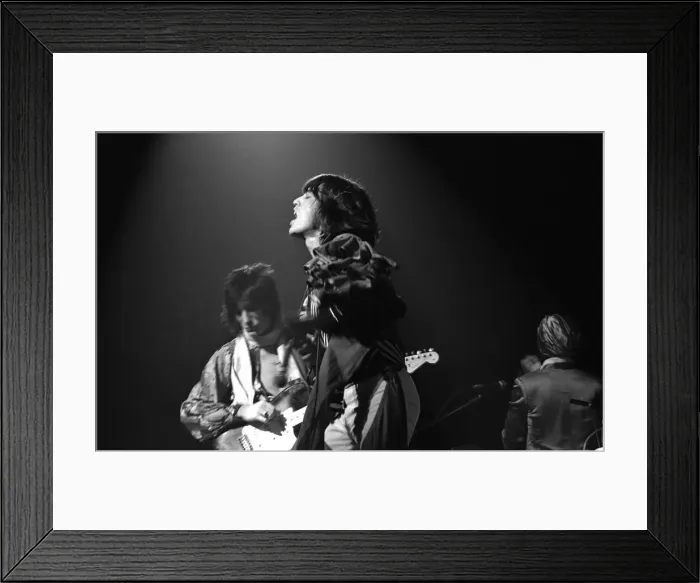 Framed Print : Mick Jagger performing on stage during a Rolling Stones concert at at New Bingley Hall