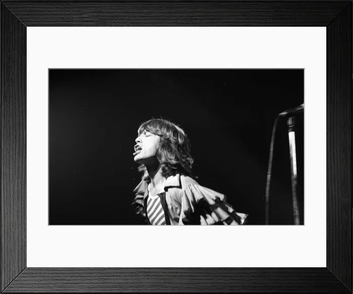 Framed Print : Mick Jagger performing on stage during a Rolling Stones concert at at New Bingley Hall