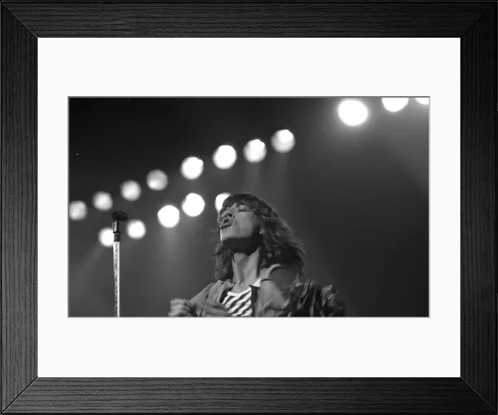 Framed Print : Mick Jagger performing on stage during a Rolling Stones concert at at New Bingley Hall