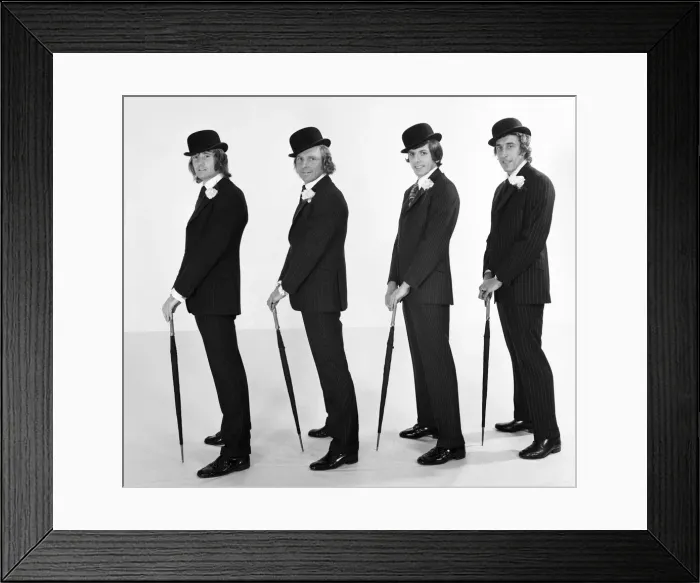 Framed Print : England footballers pose in the studio dressed as John Steed