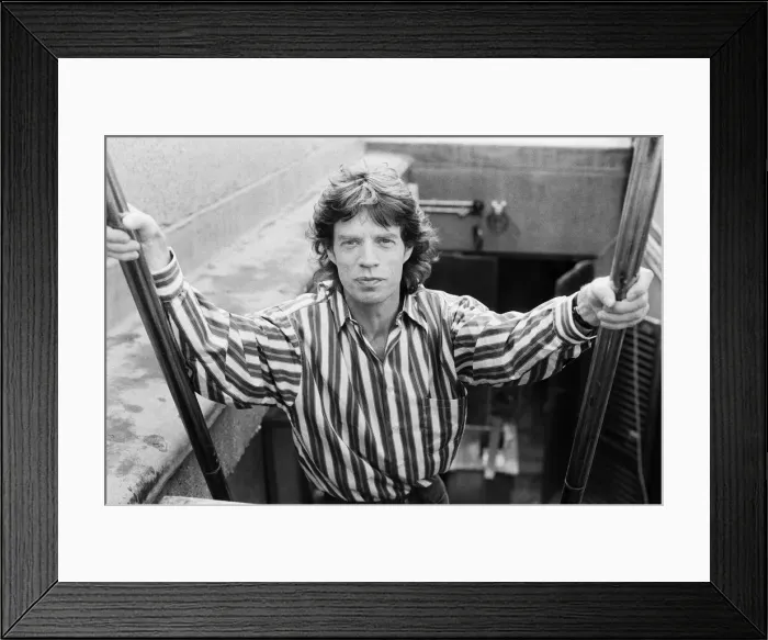 Framed Print : Rolling Stones singer Mick Jagger posing on top of the Daily Mirror Newspaper building Framed Print : Rolling Stones singer Mick Jagger posing on top of the Daily Mirror Newspaper building