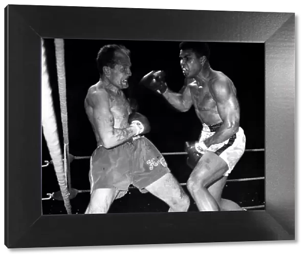 Cassius Clay ( Muhammad Ali ), World Heavyweight Champion and challenger