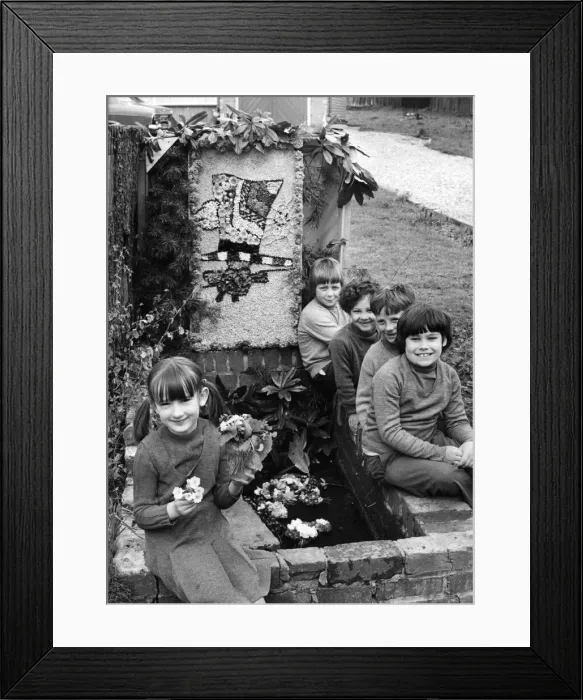 Framed Print : Children decided to say it with flowers'and helped prepare their Framed Print : Children decided to say it with flowers'and helped prepare their