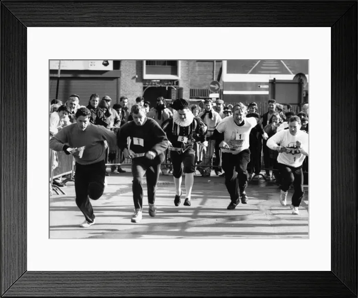 Framed Print : The Row and Flea Market Pancake Race around the stalls of the market in Birmingham City Framed Print : The Row and Flea Market Pancake Race around the stalls of the market in Birmingham City