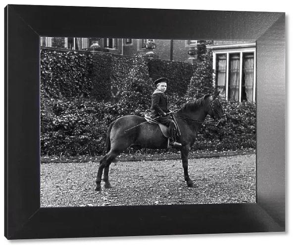 Portrait of the then Duke of York, later to be King George VI on horseback. 1902