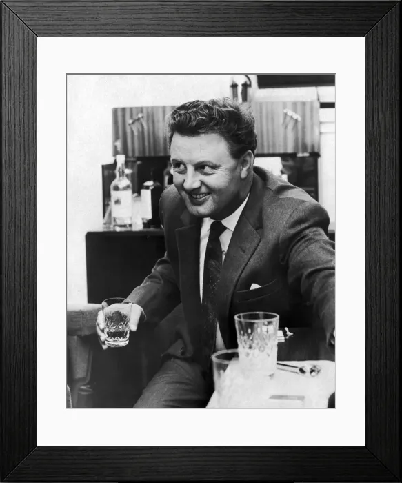 Framed Print : Before the Bubble Burst'A cheerful Dennis Loraine, glass in hand