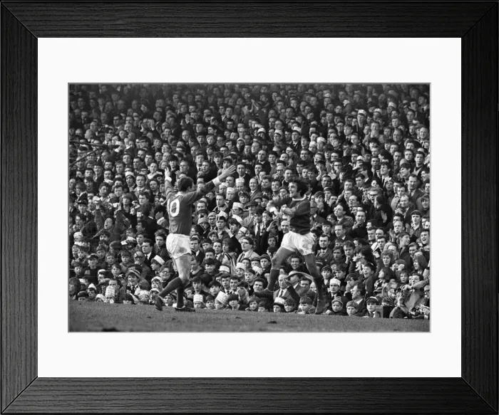 Framed Print : Manchester United footballer George Best celebrates after scoring the third goal against Framed Print : Manchester United footballer George Best celebrates after scoring the third goal against