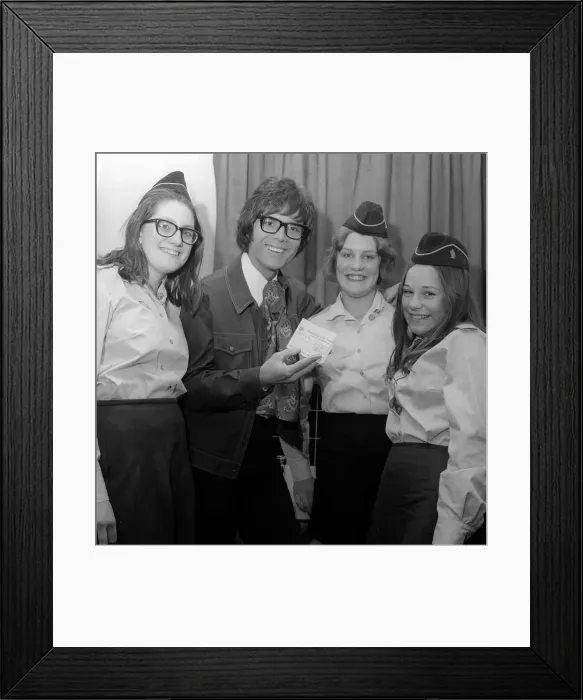 Framed Print : A young Cliff Richard receiving a cheque for £61 that has been presented for Framed Print : A young Cliff Richard receiving a cheque for £61 that has been presented for