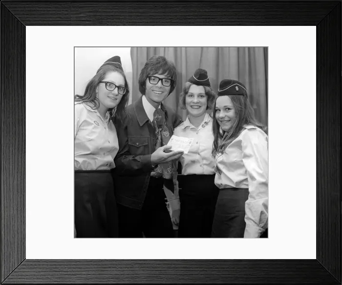 Framed Print : A young Cliff Richard receiving a cheque for £61 that has been presented for Framed Print : A young Cliff Richard receiving a cheque for £61 that has been presented for