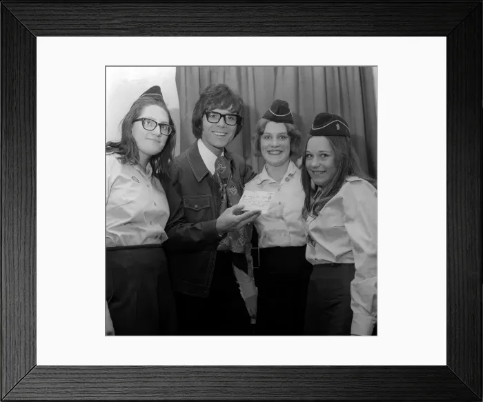 Framed Print : A young Cliff Richard receiving a cheque for £61 that has been presented for