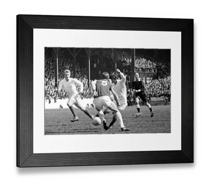 Framed Print : Manchester United footballer George Best in action during the match against West Ham Framed Print : Manchester United footballer George Best in action during the match against West Ham