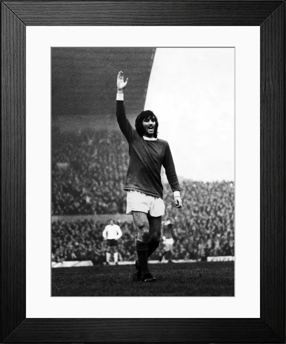 Framed Print : Manchester United footballer George Best celebrates after scoring a lobbed goal against Framed Print : Manchester United footballer George Best celebrates after scoring a lobbed goal against