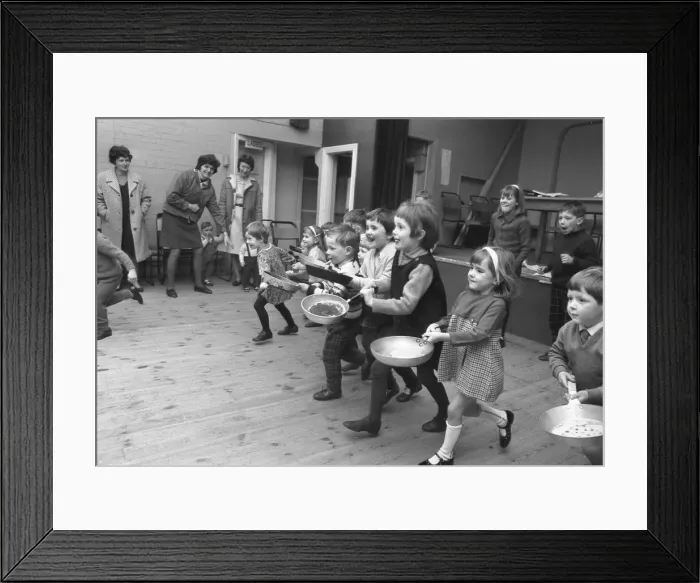 Framed Print : Youngsters take part in a pancake race at Styvechale Young Wives Club in Coventry Framed Print : Youngsters take part in a pancake race at Styvechale Young Wives Club in Coventry