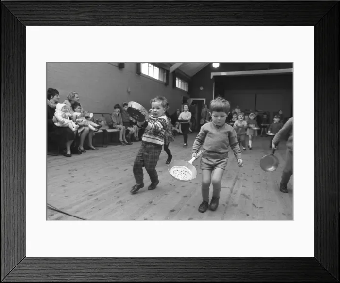Framed Print : Youngsters take part in a pancake race at Styvechale Young Wives Club in Coventry Framed Print : Youngsters take part in a pancake race at Styvechale Young Wives Club in Coventry